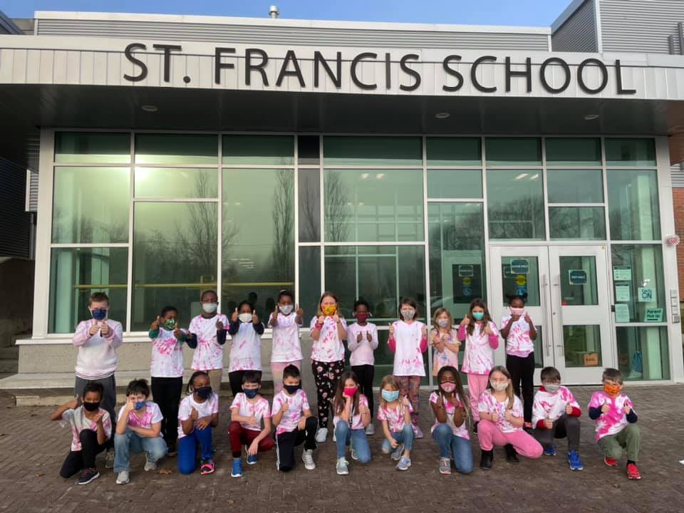 Students dress in pink.